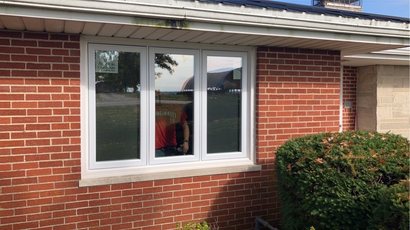 Finished white three-panel replacement window