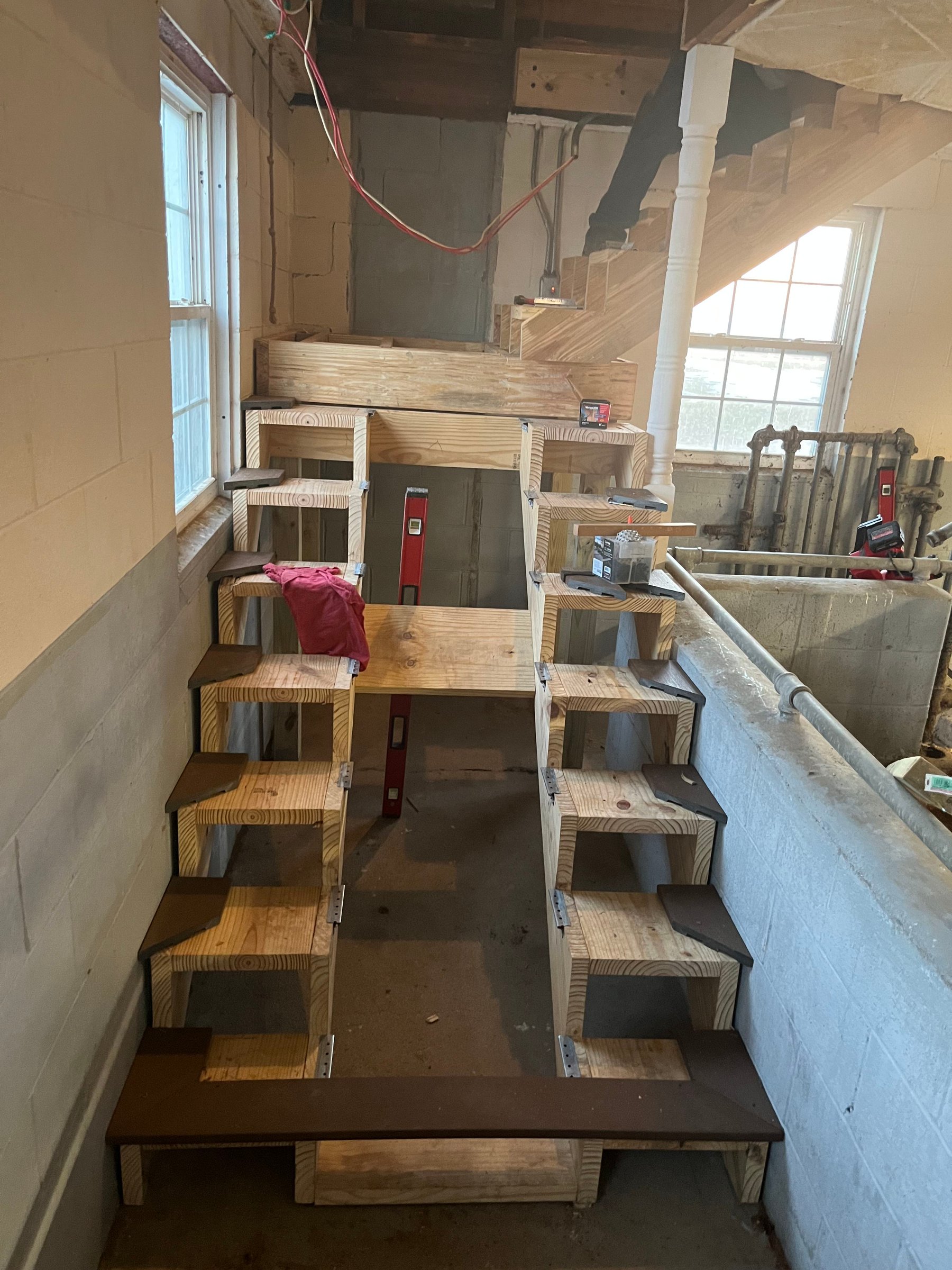 Custom interior staircase during framing
