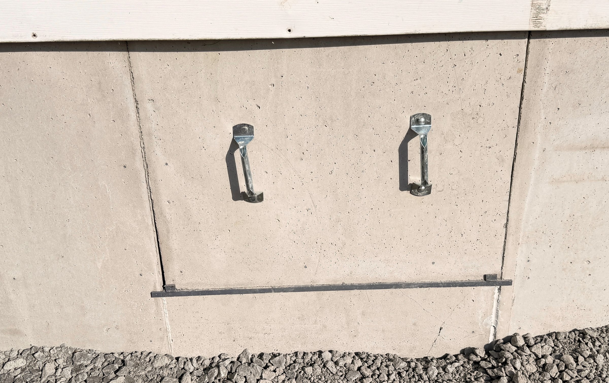 Finished DuraSkirt access panel with two metal handles